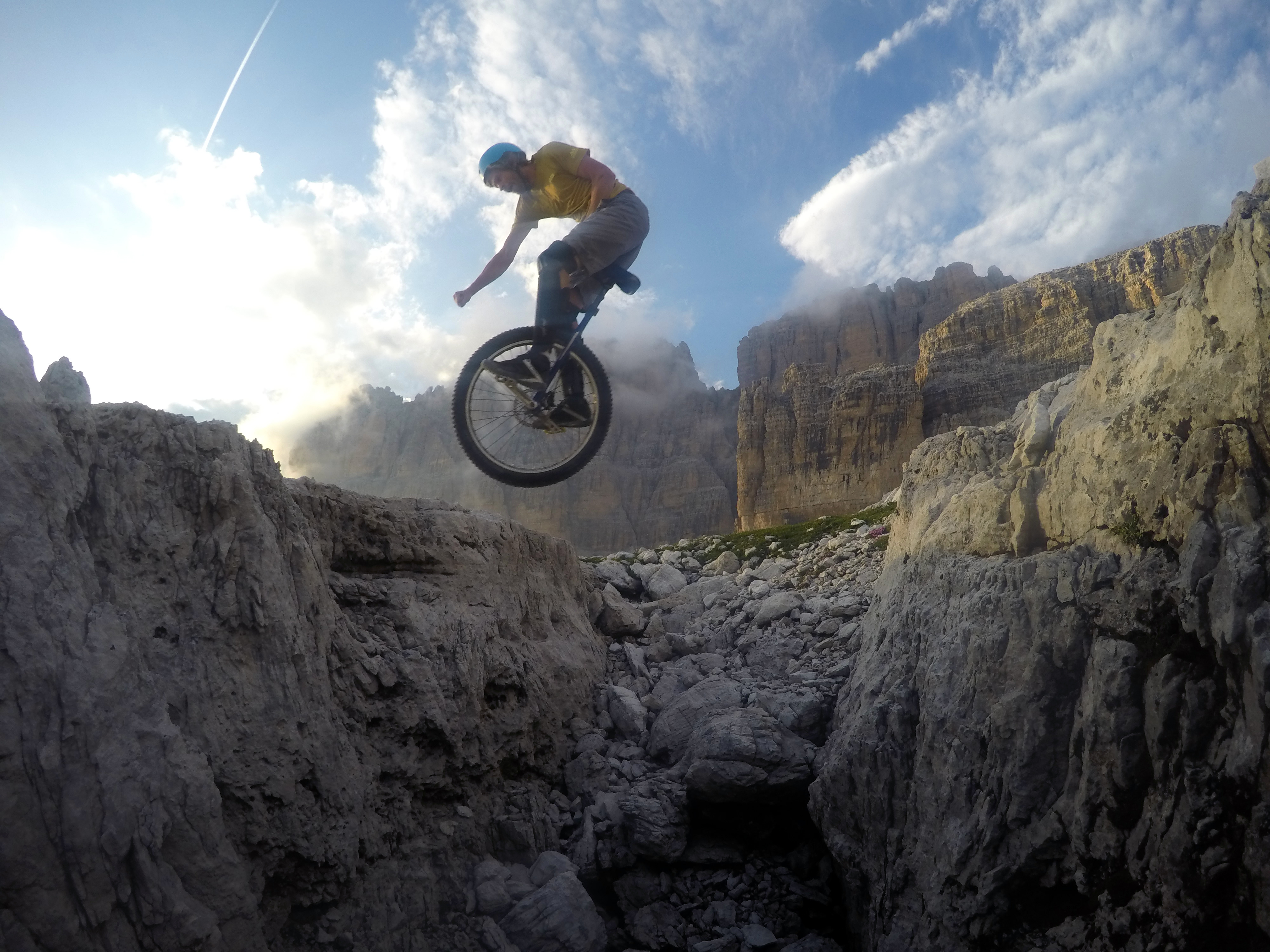 Lutz Eichholz jumping a huge gap in the Dolomites, Italy