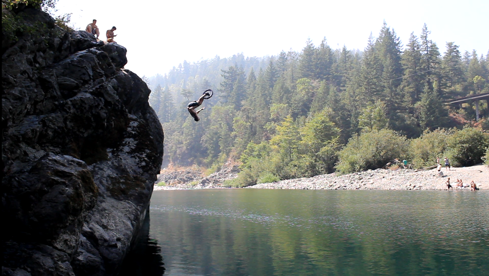 Alex doing a flip down a cliff with his unicycle